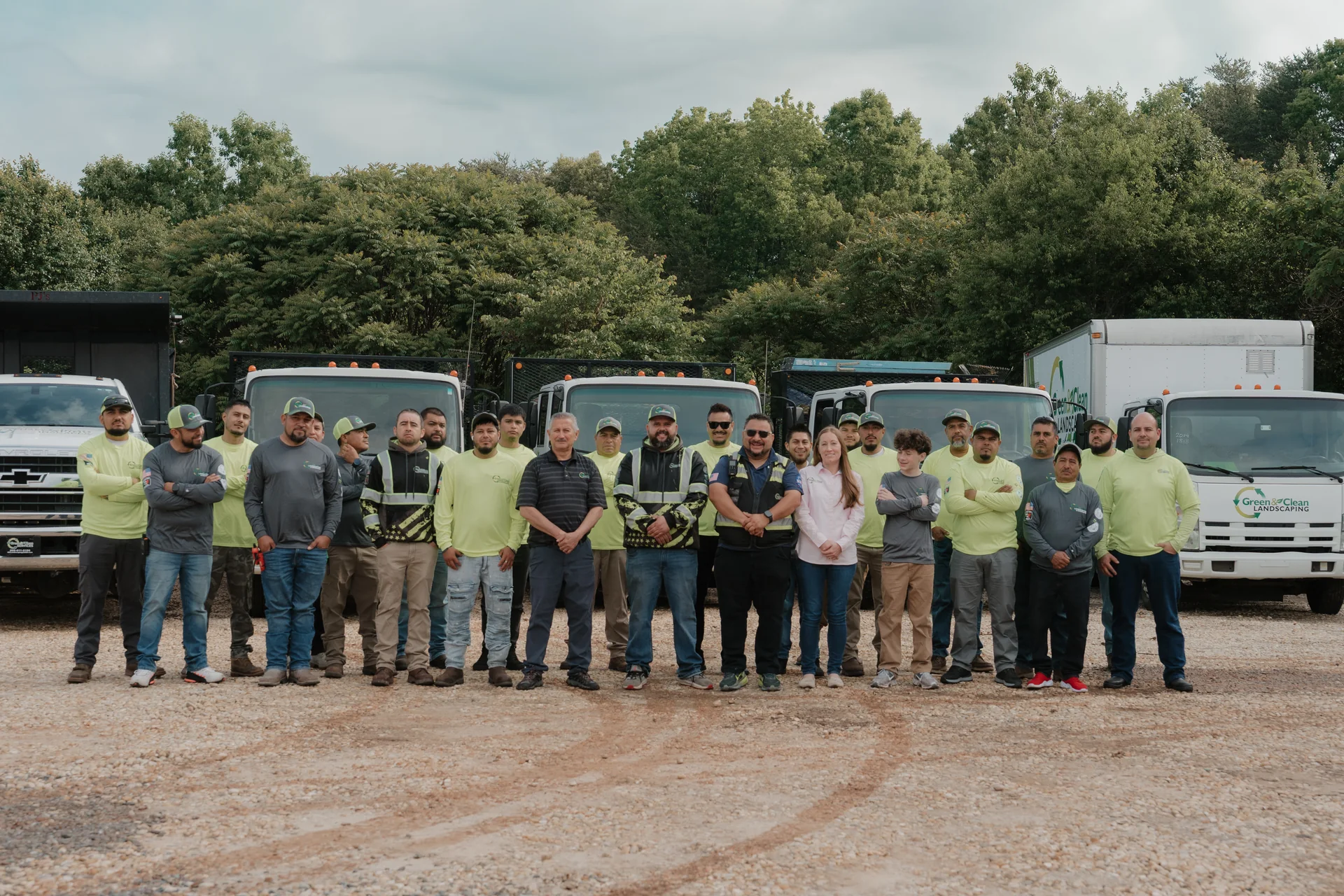 Green and Clean Landscaping crew and trucks — Greensboro NC
